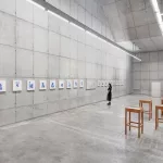 *"Fulgor Atlântico"* by Tiago Sant'Ana features an installation with the *Itutu* series in cobalt blue and a video exploring speech and listening. The works address themes of memory, identity, and Yoruba cultural traditions, connecting history, aesthetics, and Afro-diasporic resistance, highlighting the enduring influence of the African diaspora in Brazil.